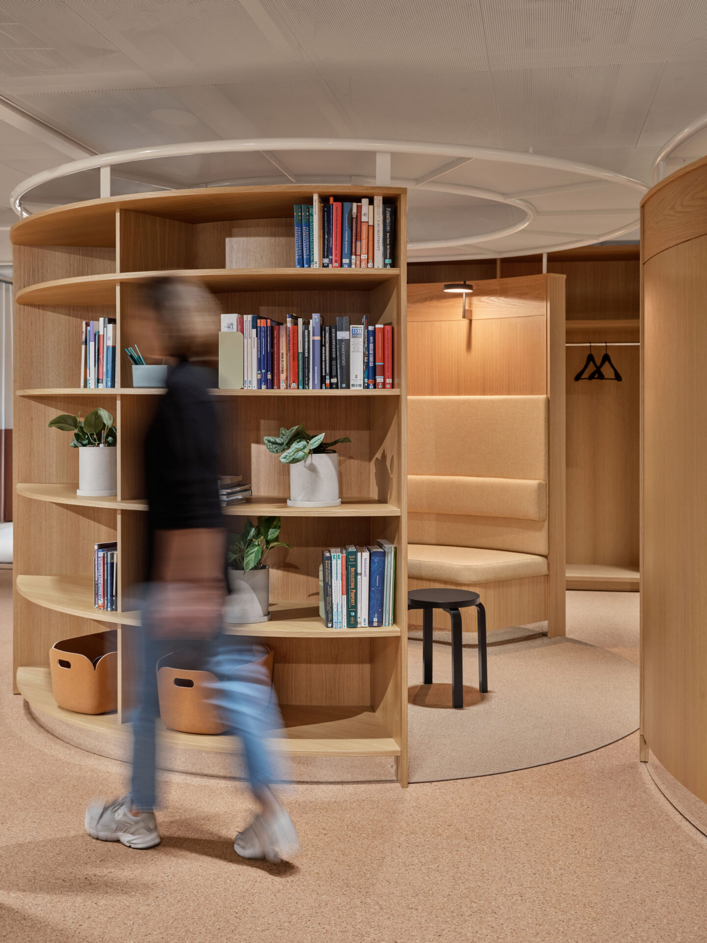 rounded shelve, custom made furniture, wooden, light carpet, modern office design